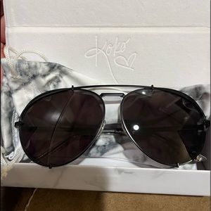 Diff x Khloe Kardashian place aviator sunglasses